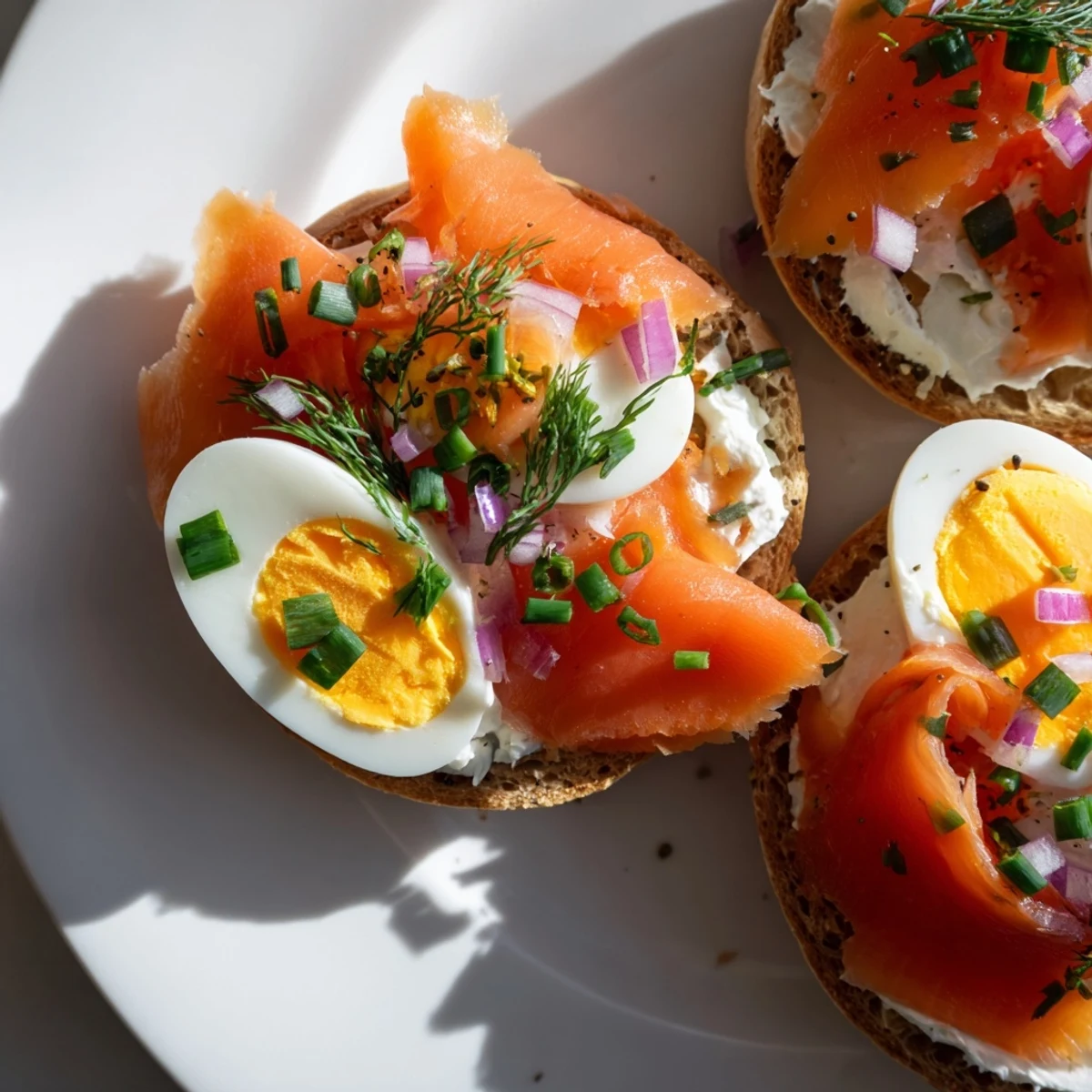 Delicious Cranberry Sleigh Bagel Board, showcasing colorful bagels with creamy spreads and festive garnishes.