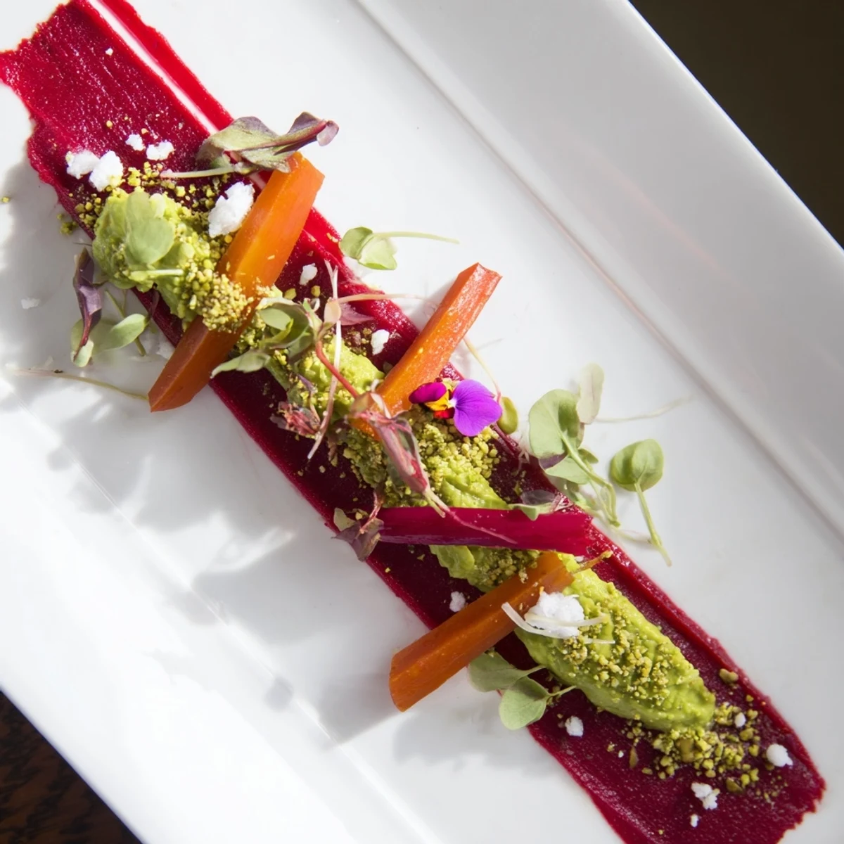 Picture a bold stripe of The Modernist Stripe, a colorful vegetarian appetizer with texture and flair.