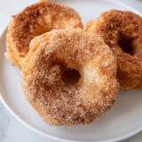 Close-up of fluffy 1-Minute Air Fryer Donuts, air-fried to perfection, a quick, easy dessert.