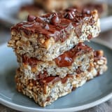 Keine-Backen Erdnussbutter-Haferflocken-Bissen mit Schokoladenstückchen und Haferflocken