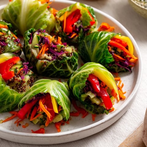 Bright and colorful Rainbow Sauerkraut Rolls, beautifully arranged, ready to be enjoyed as a vegetarian main dish.