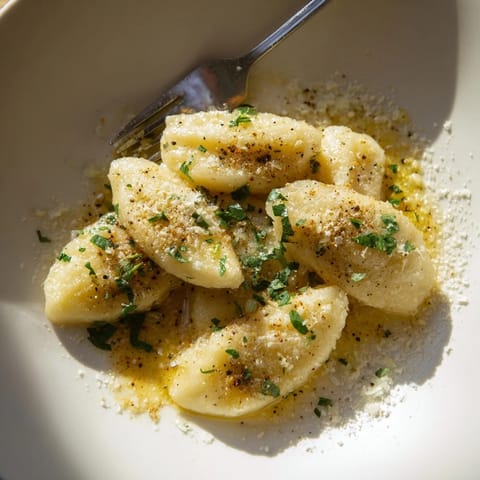 Kartoffelknödel mit Parmesanbutter
