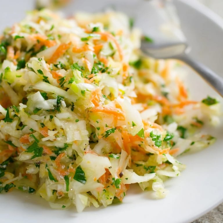 Tangy Sauerkraut and Apple Slaw, ideal as a side for grilled sausages or sandwiches.