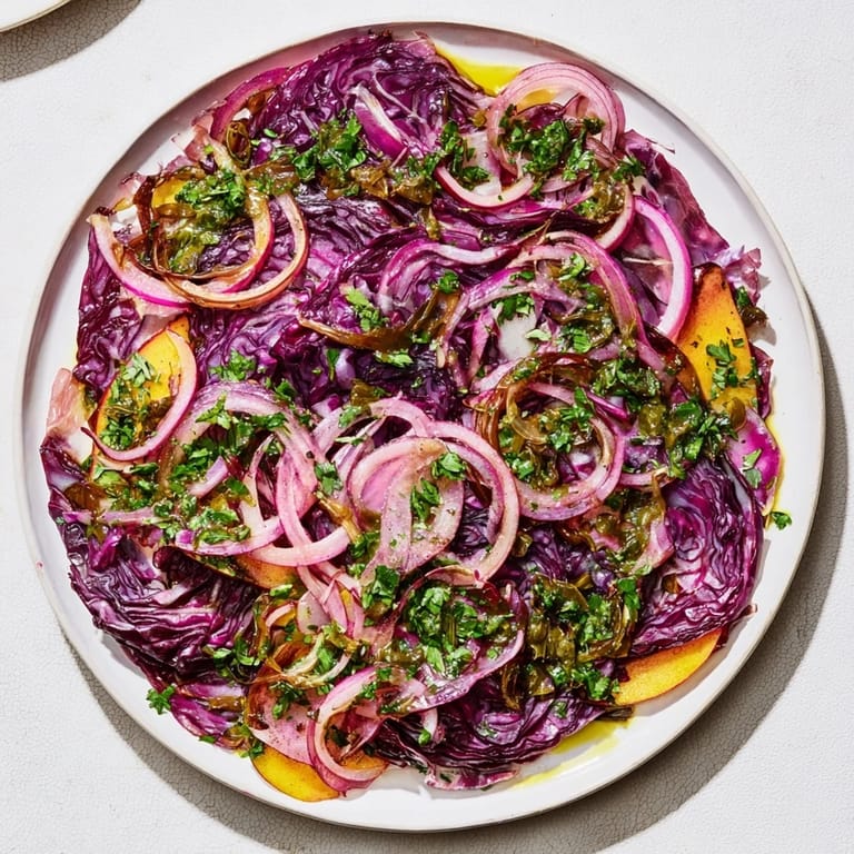 Steaming Spiced Red Cabbage Bake, richly spiced with caramelized onions, topped with vibrant green salsa.